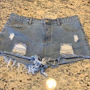 Women’s SHEIN ripped jean shorts